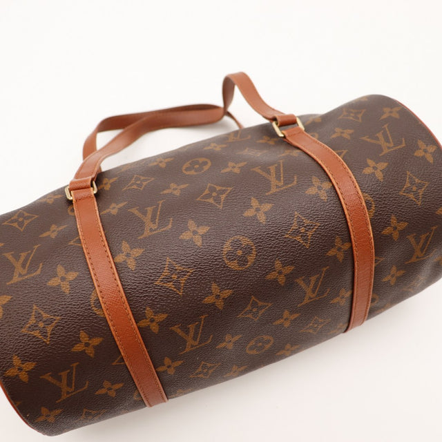 Détail anses cuir vachette patine caramel Louis Vuitton Papillon 30 — AMANA Vintage