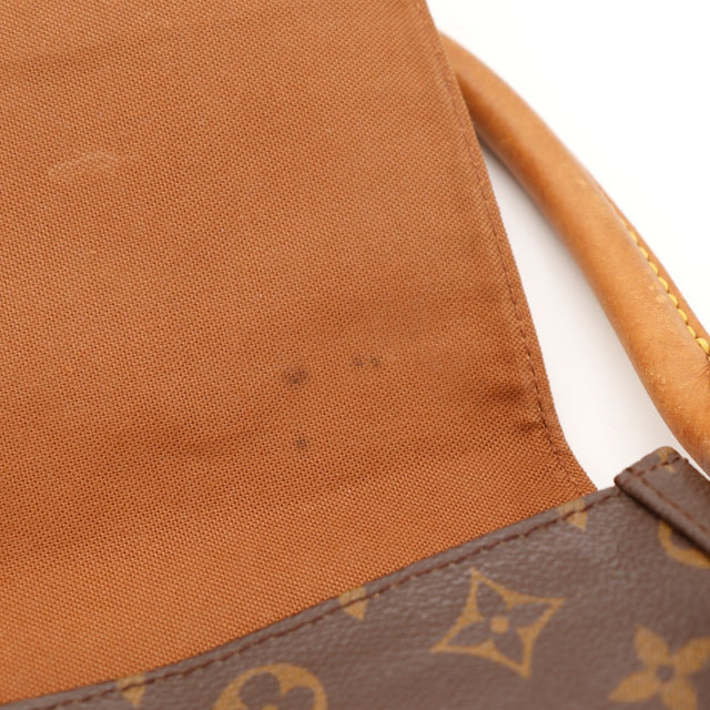 Louis Vuitton Looping intérieur doublure textile taches — AMANA Vintage