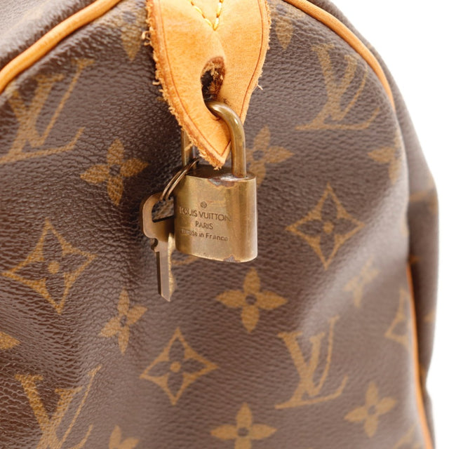 Vue latérale Louis Vuitton Speedy 30 cuir vachette caramel — AMANA Vintage