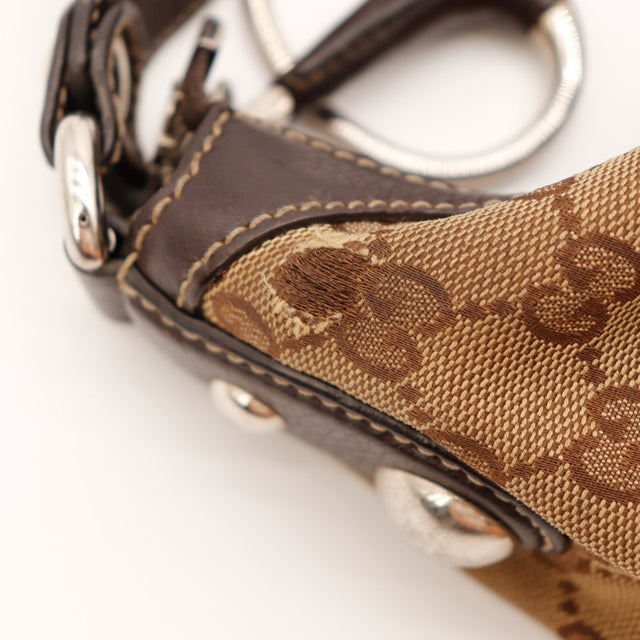 Détail coins usure toile Hobo Gucci monogrammée — AMANA Vintage