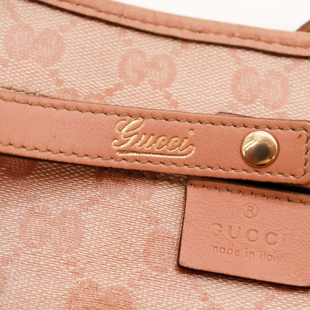Détail étiquette cuir et bande intérieure Gucci Hobo rose — AMANA Vintage