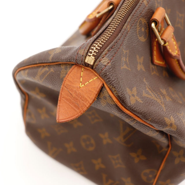 Vue de côté Louis Vuitton Speedy 30 toile Monogram marron occasion authentique — AMANA Vintage