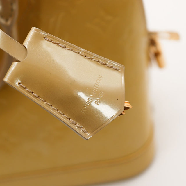 Detail porte-clef Vernis kaki Louis Vuitton Alma MM — AMANA Vintage