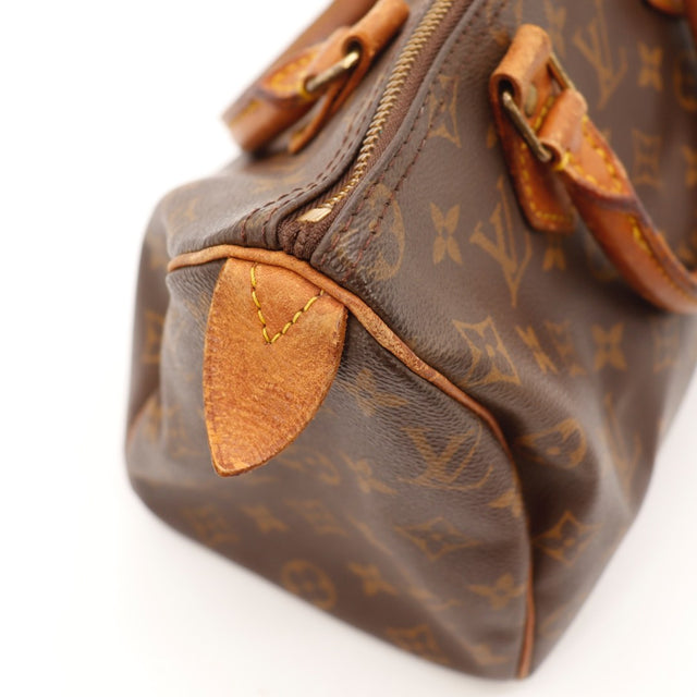 Detail toile Monogram Louis Vuitton Speedy 25 occasion authentique — AMANA Vintage