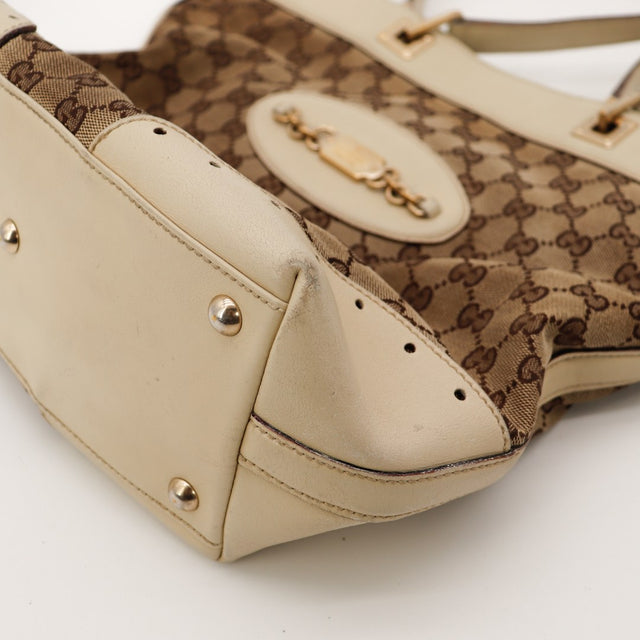 Detail coin lateral Gucci Tote Horsebit cuir ivoire traces — AMANA Vintage