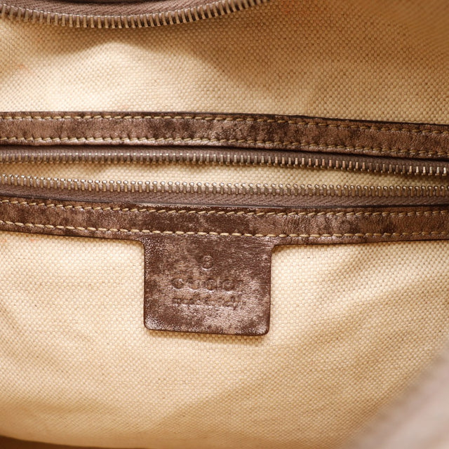 Détail intérieur doublure toile Gucci Hobo Guccissima taupe occasion — AMANA Vintage