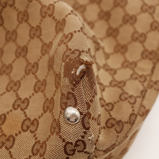 Détail coin bas Gucci Tote toile monogramme effilochée usure — AMANA Vintage