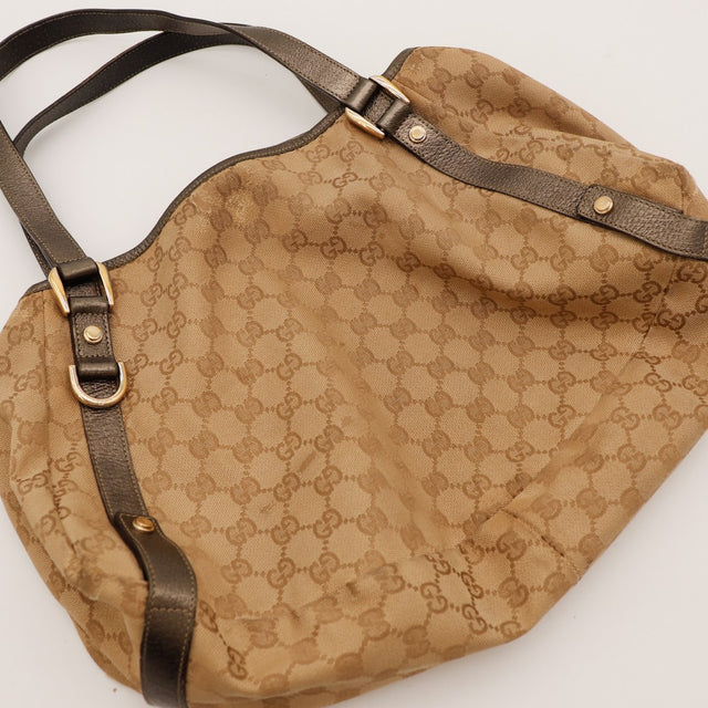 Détail anses cuir marron Hobo Gucci — AMANA Vintage