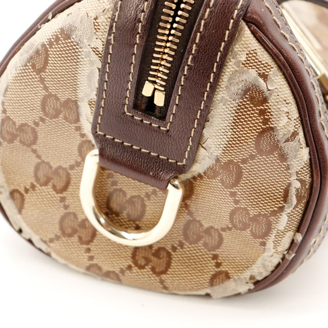 Détail côté sac Gucci Boston GG Crystal délamination visible — AMANA Vintage