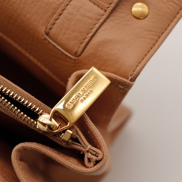 Détail curseur zip Saint Laurent Paris doré — AMANA Vintage