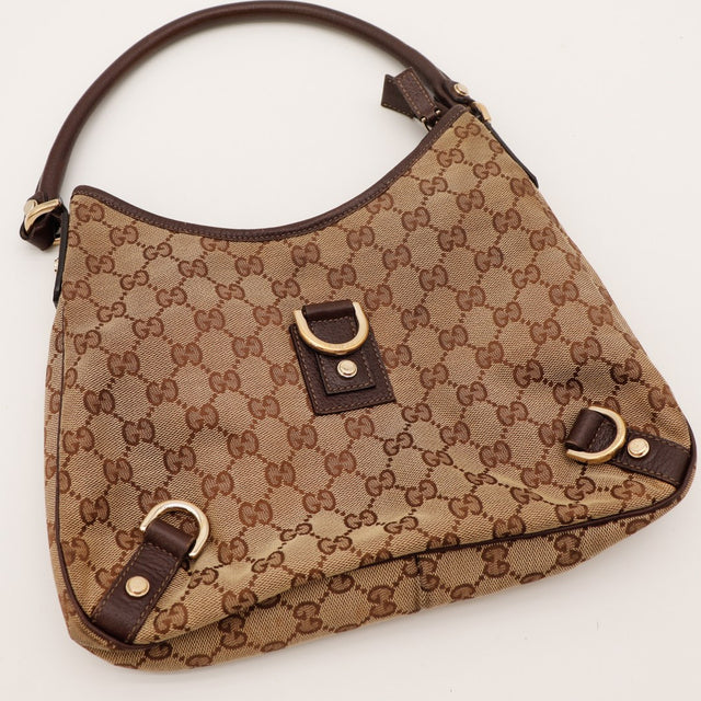 Détail anse cuir marron Gucci Hobo D-Ring vintage — AMANA Vintage