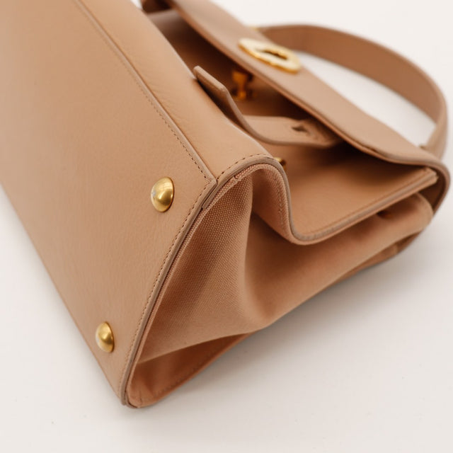Vue angle bas sac Saint Laurent Muse cuir camel — AMANA Vintage