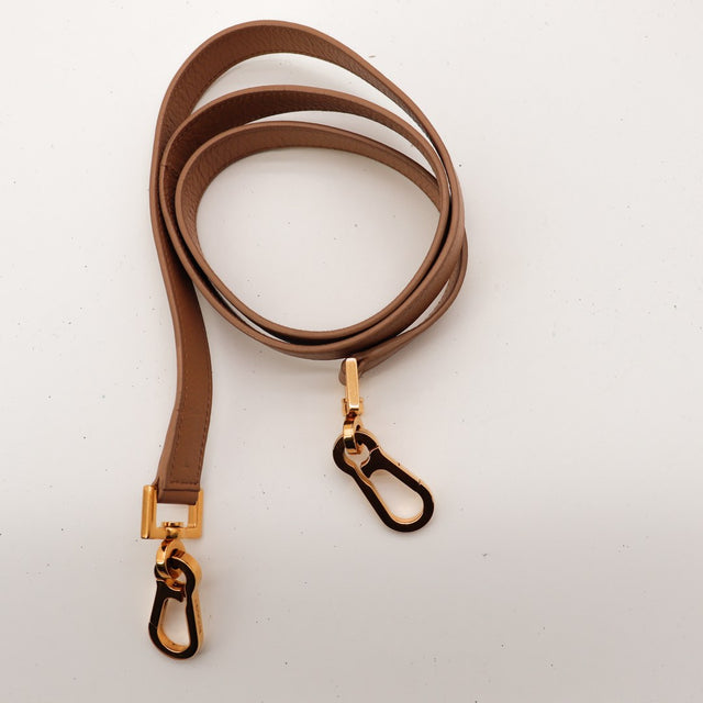 Vue coin bas Saint Laurent Muse cuir camel pieds dorés — AMANA Vintage