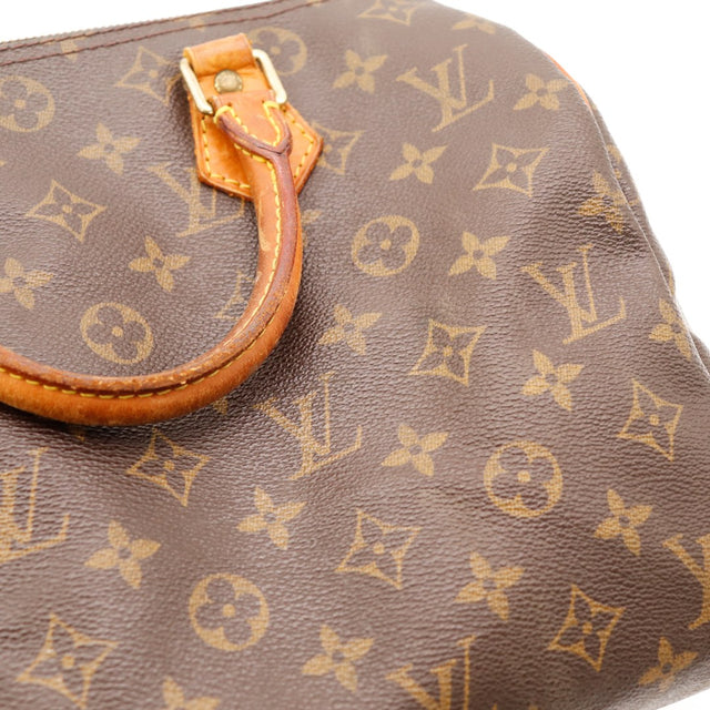 Detail languette cadenas vachette patine Louis Vuitton Speedy 30 — AMANA Vintage