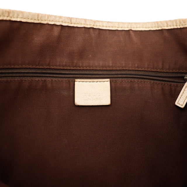 Détail déchirure coin inférieur canvas Hobo Gucci — AMANA Vintage
