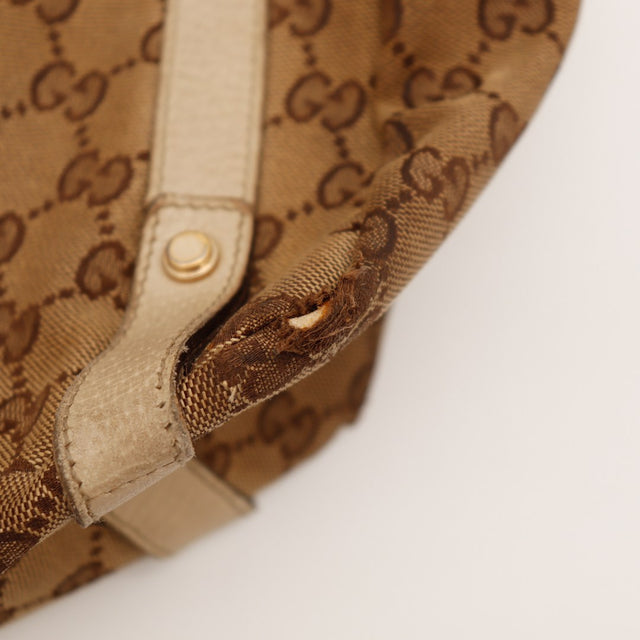Détail fermoir anneau doré et cuir beige Hobo Gucci — AMANA Vintage