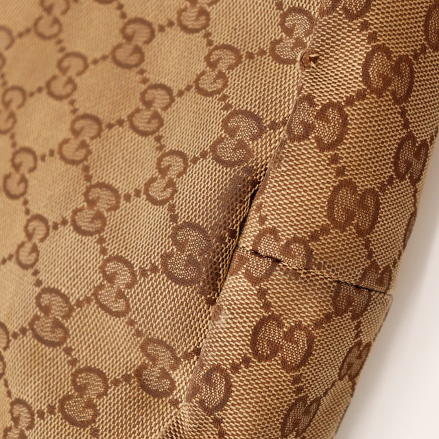 Intérieur doublure marron Hobo Gucci avec étiquette Gucci — AMANA Vintage