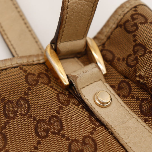Détail attache anse cuir beige usé et fermoir doré Hobo Gucci — AMANA Vintage