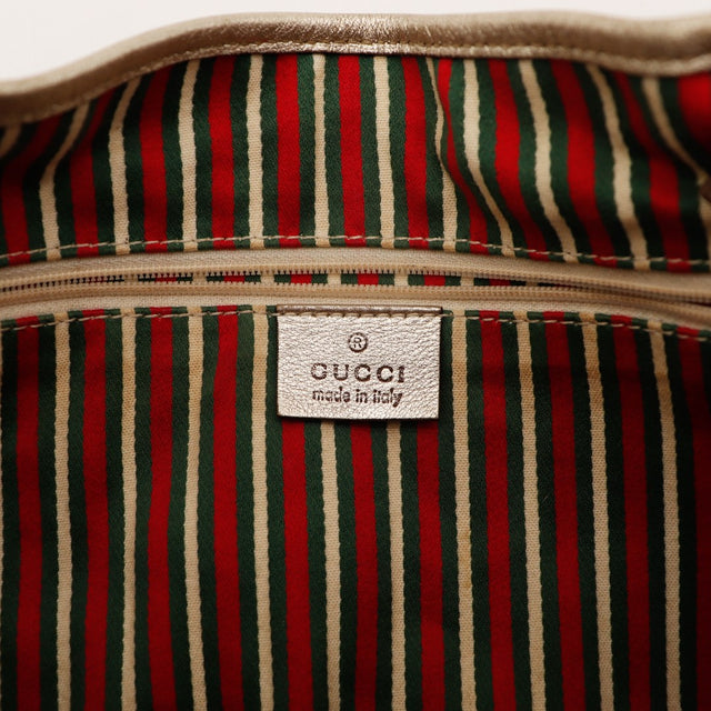 Intérieur doublure rayée Gucci Hobo étiquette made in Italy — AMANA Vintage