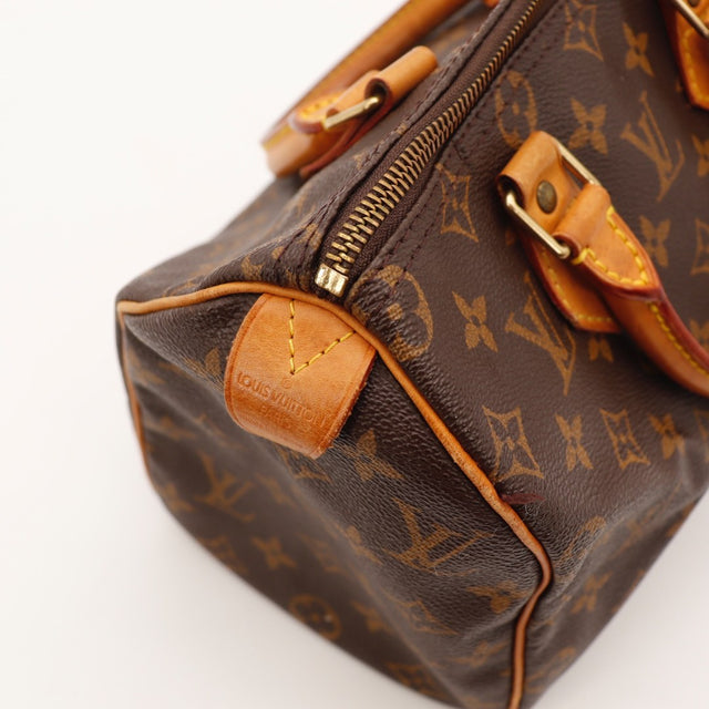 Vue de côté Louis Vuitton Speedy 25 toile Monogram — AMANA Vintage