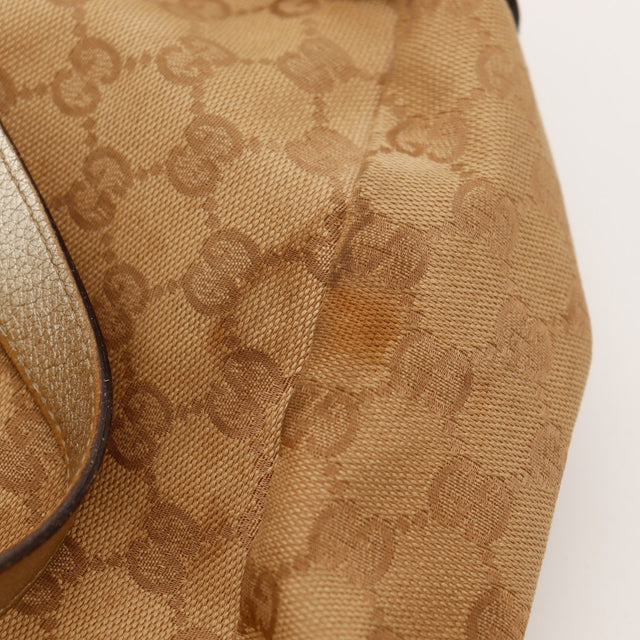 Détail coin supérieur toile monogrammée Gucci Hobo traces de contact — AMANA Vintage