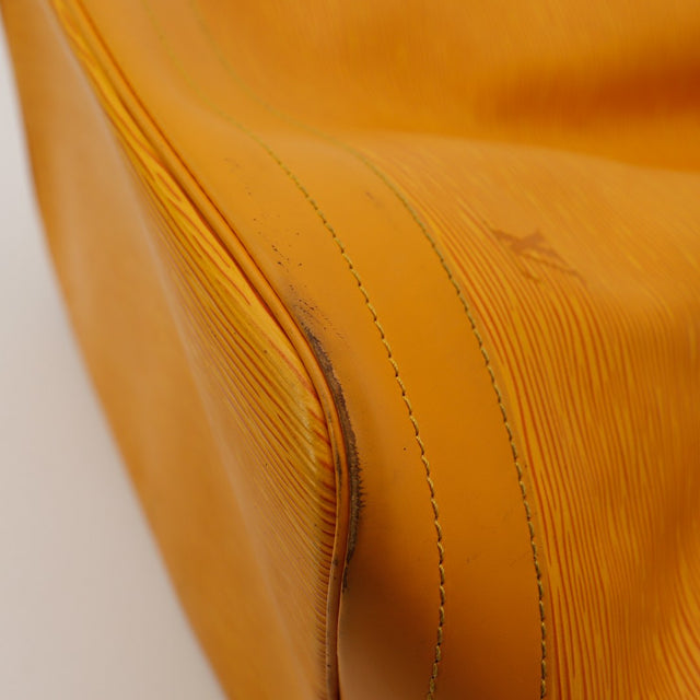 Detail cordelette Louis Vuitton Noe Epi Jaune cuir effrite — AMANA Vintage