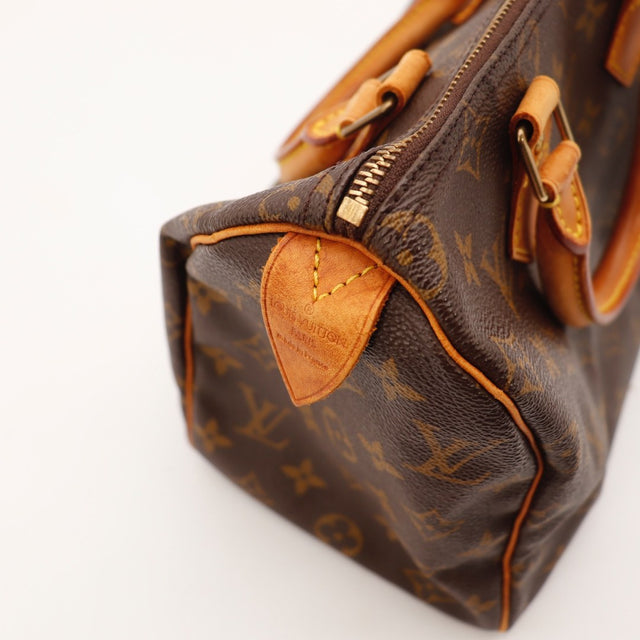 Détail argenterie dorée Louis Vuitton Speedy 25 toile Monogram — AMANA Vintage