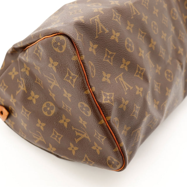 Detail coin bas Louis Vuitton Speedy 35 toile Monogram lisere cuir — AMANA Vintage