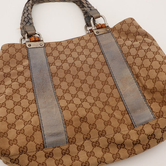 Détail anses tressées et embout bambou Gucci Tote Bag usure visible — AMANA Vintage