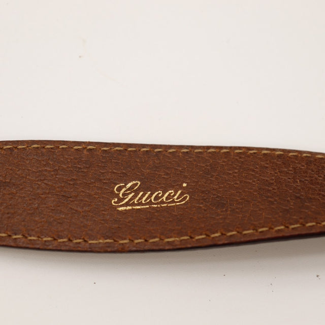 Gucci New Jackie détail anse cuir grainé marron inscription Gucci — AMANA Vintage