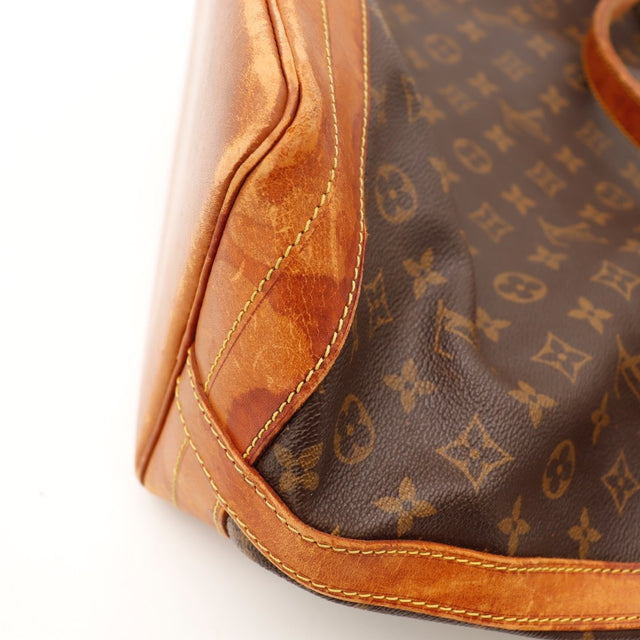 Détail boucle et œillets dorés Louis Vuitton Noé GM — AMANA Vintage