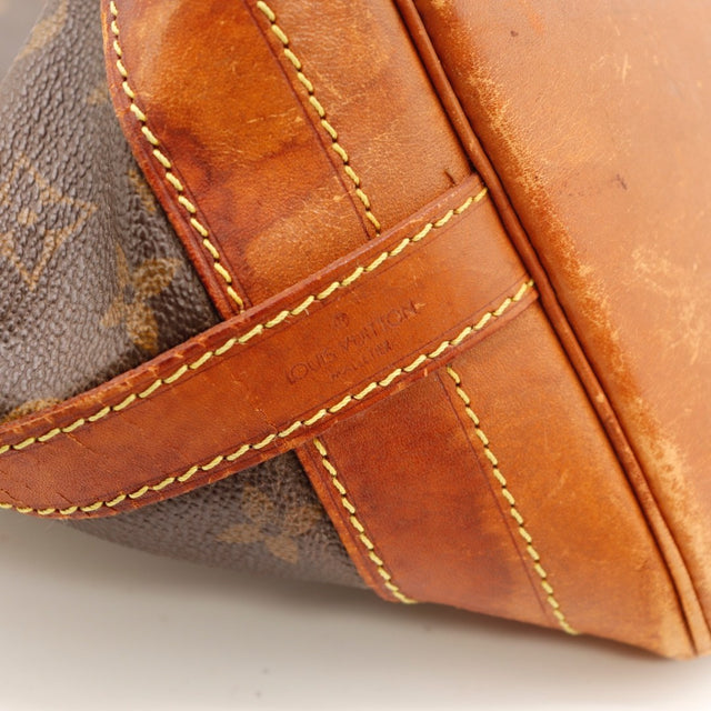 Vue de profil sac seau Louis Vuitton Noé GM Monogram marron — AMANA Vintage