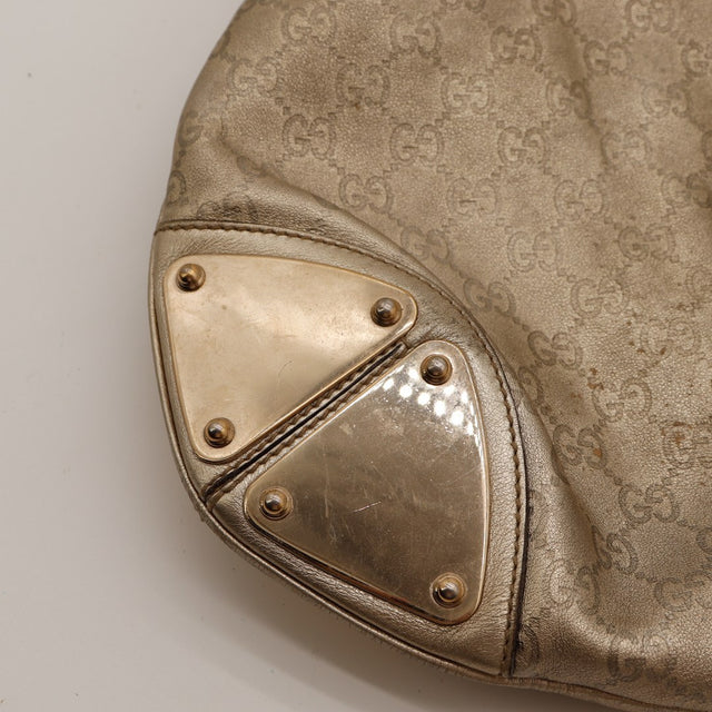 Gucci Indy Hobo détail coin plaque métallique usée frottements — AMANA Vintage