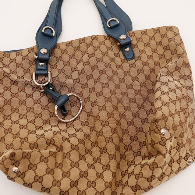 Détail anneau signature argenté Tote Bag Gucci toile monogrammée — AMANA Vintage