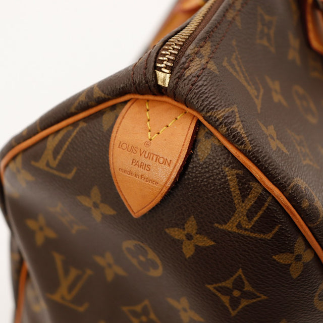 Detail coin inferieur gauche Louis Vuitton Speedy 40 toile Monogram — AMANA Vintage