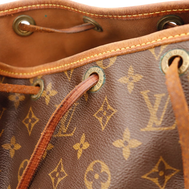 Vue de profil sac seau Louis Vuitton Noé GM Monogram marron — AMANA Vintage