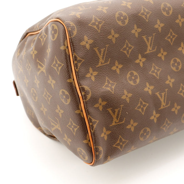 Detail coin inferieur droit Louis Vuitton Speedy 40 toile Monogram — AMANA Vintage