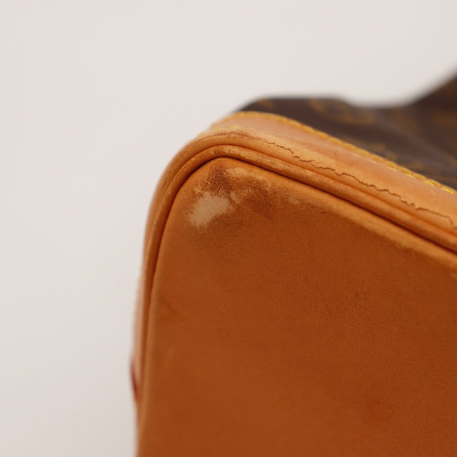 Vue de profil sac seau Louis Vuitton Noé GM Monogram marron — AMANA Vintage