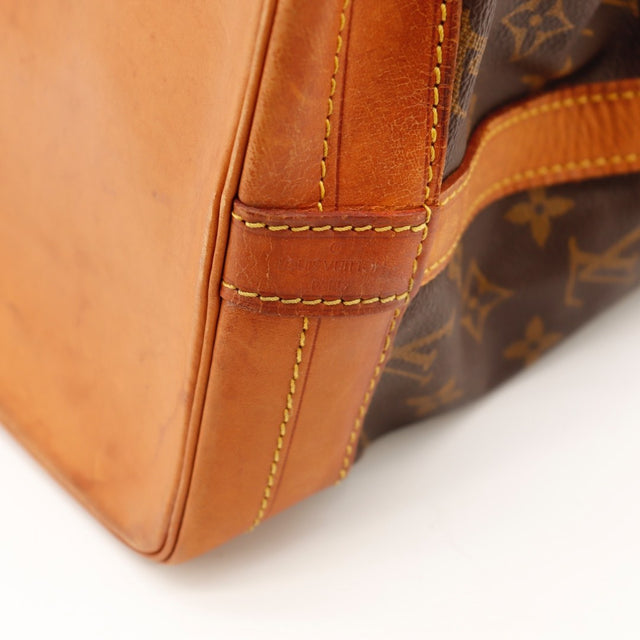 Vue de profil sac Louis Vuitton Noé GM toile Monogram occasion authentique — AMANA Vintage