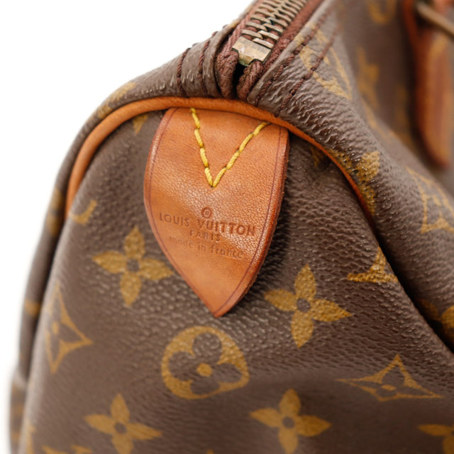 Vue coin inferieur lateral Louis Vuitton Speedy 35 toile Monogram — AMANA Vintage
