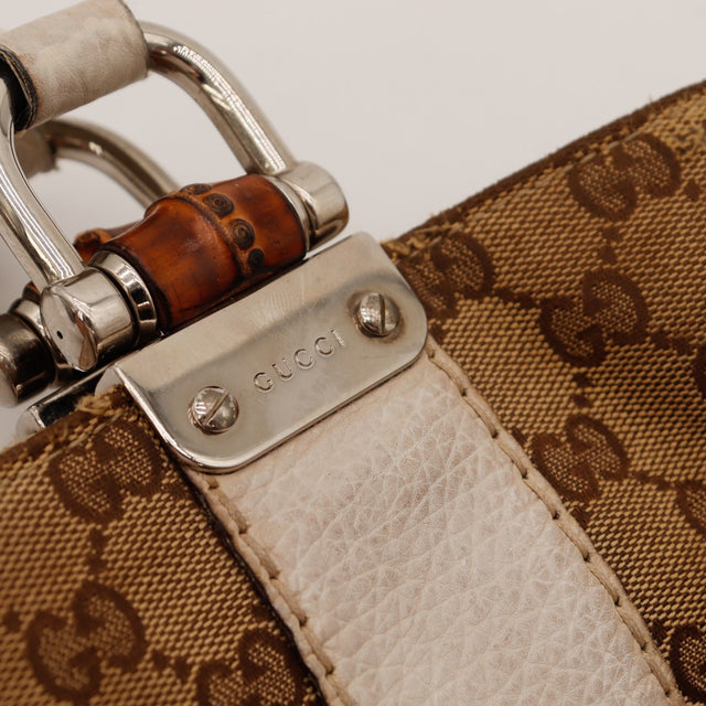 Détail piston bambou et plaque Gucci Tote Bag monogramme — AMANA Vintage