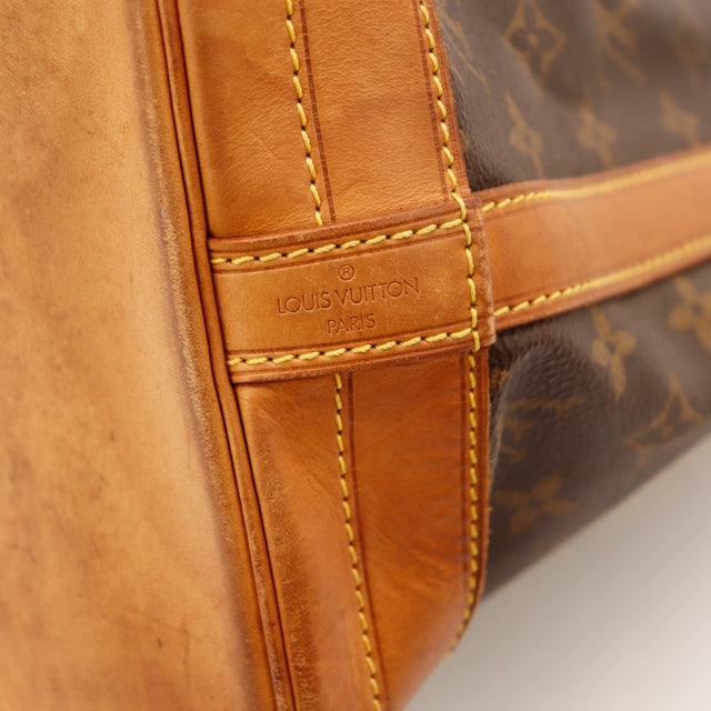 Vue de profil Louis Vuitton Noé GM toile Monogramme marron occasion authentique — AMANA Vintage