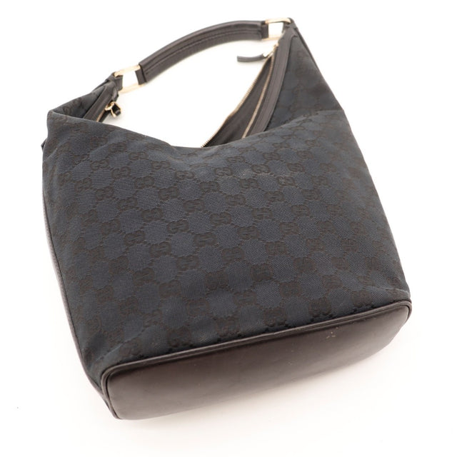 Détail fermeture éclair et tirette cuir Gucci Hobo — AMANA Vintage