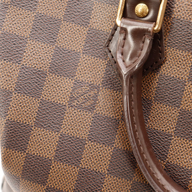 Détail tirette en cuir Louis Vuitton Speedy 30 Damier Ebène occasion — AMANA Vintage