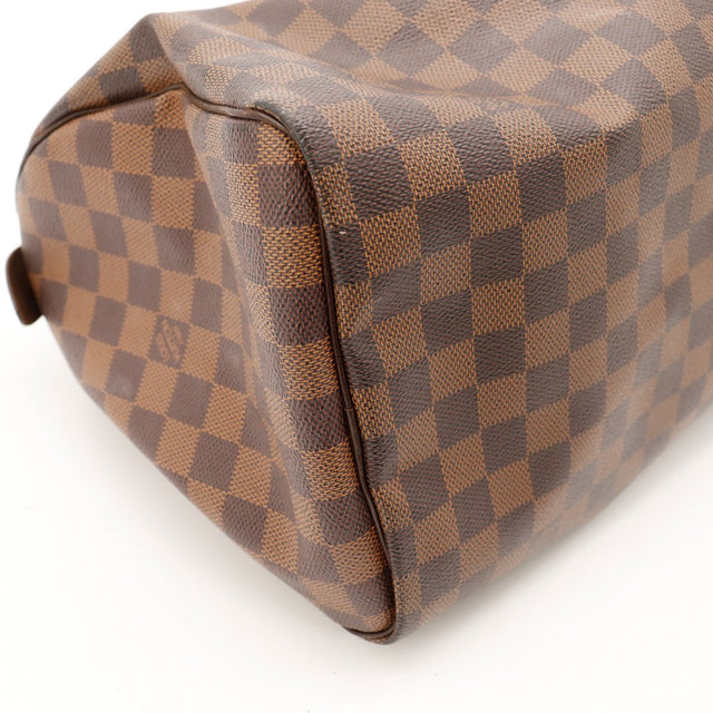 Détail coin et lisère Louis Vuitton Speedy 30 Damier Ebène occasion — AMANA Vintage