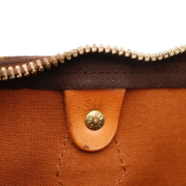 Détail des anses Louis Vuitton Speedy 30 cuir vachette occasion authentique — AMANA Vintage