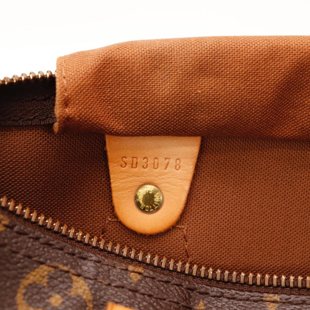 Détail des anses Louis Vuitton Speedy 30 cuir vachette occasion authentique — AMANA Vintage