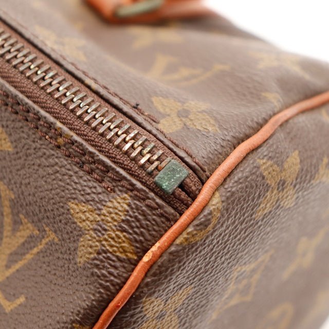 Détail cuir vachette anse Louis Vuitton Papillon 30 patine caramel — AMANA Vintage