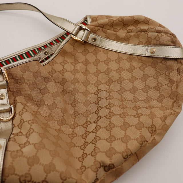 Intérieur doublure rayée rouge vert blanc Gucci Hobo — AMANA Vintage