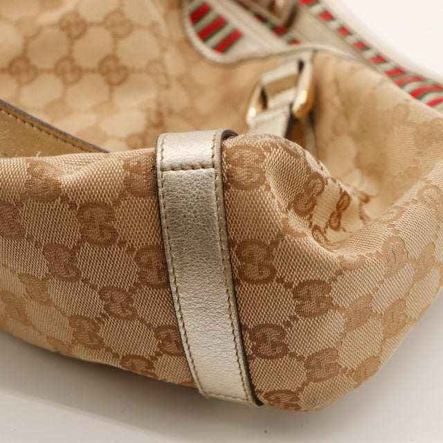 Détail coin intérieur Gucci Hobo doublure et cuir — AMANA Vintage